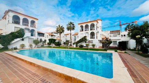 Bungalow en venta en Playa Flamenca, 2 dormitorios., immagine 2