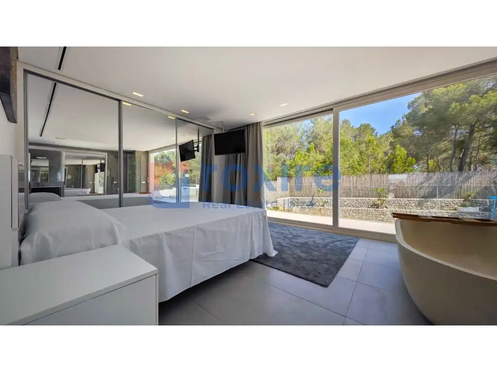 Dormitori de Casa o xalet en venda en Santa Eulària des Riu amb Aire condicionat, Jardí privat i Terrassa