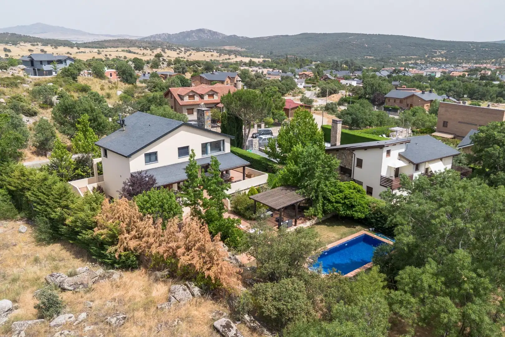 Vista exterior de Casa o chalet en venta en El Boalo - Cerceda – Mataelpino con Calefacción, Terraza y Piscina