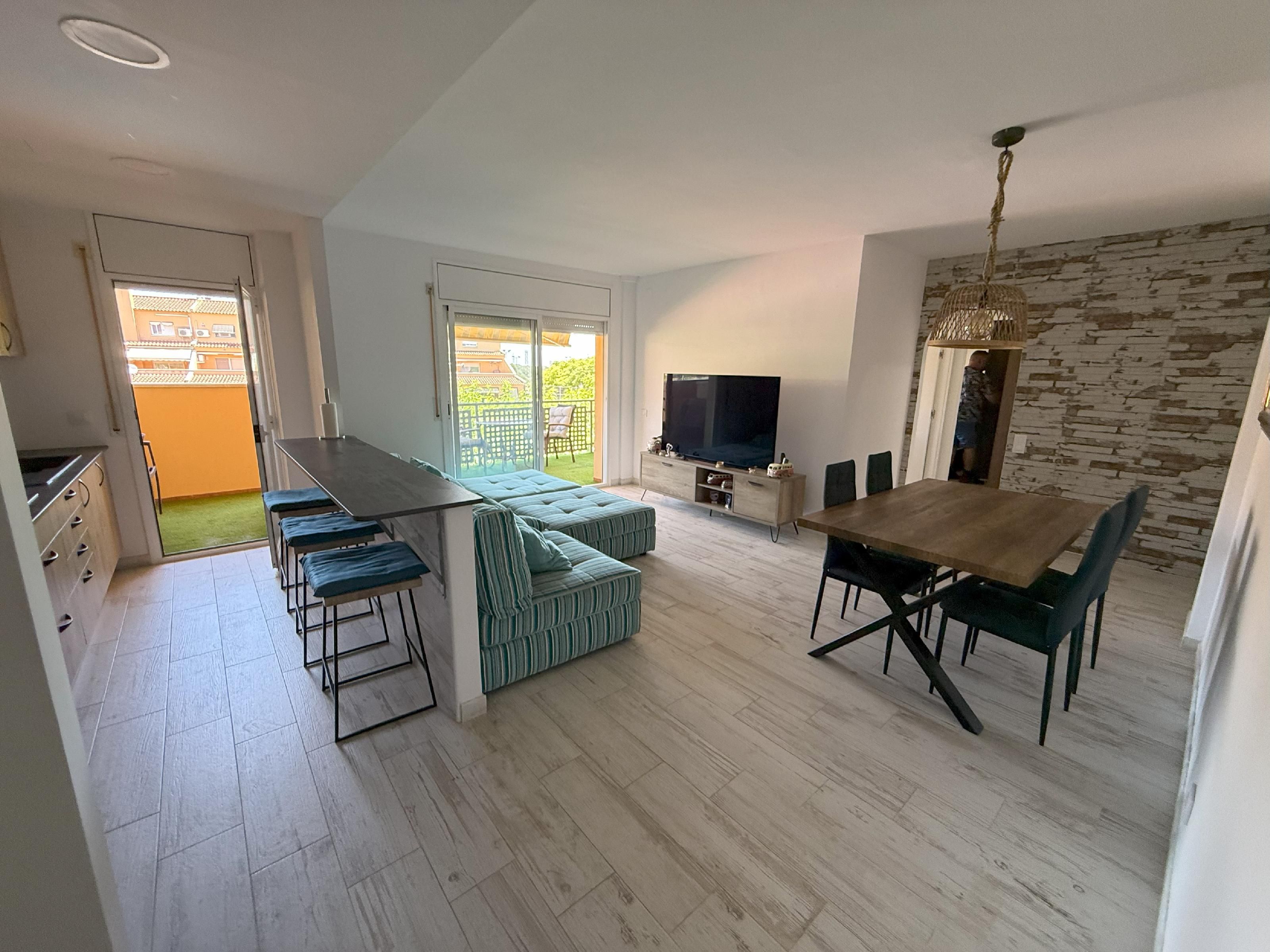 Living room of Apartment for sale in Roda de Berà  with Private garden, Terrace and Swimming Pool