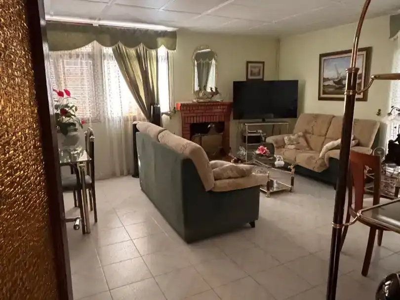 Sala d'estar de Casa o xalet en venda en El Campillo (Huelva) amb Jardí privat, Traster i Moblat