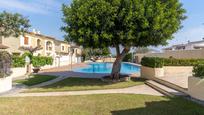 Swimming pool of Single-family semi-detached for sale in Roda de Berà  with Air Conditioner, Terrace and Swimming Pool