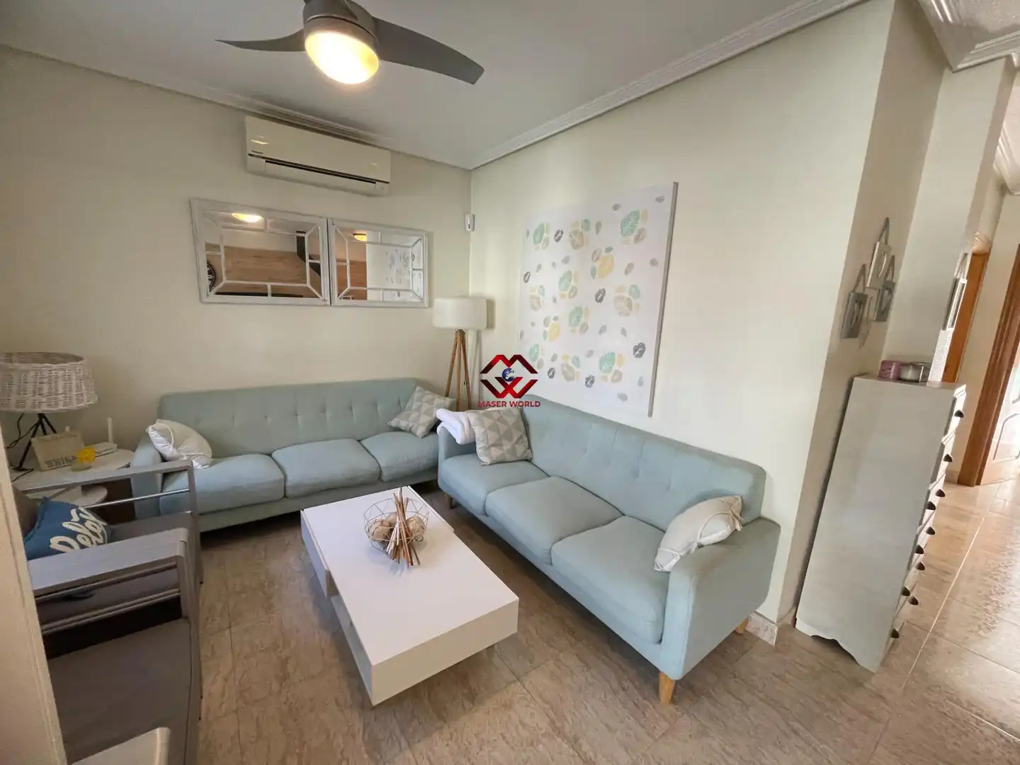 Sala d'estar de Casa adosada en venda en Pilar de la Horadada