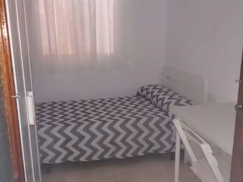 Schlafzimmer von Wohnung zur Miete in Osuna mit Klimaanlage, Privatgarten und Möbliert