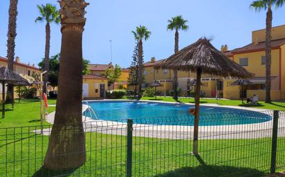 Swimming pool of Single-family semi-detached for sale in Islantilla  with Air Conditioner, Heating and Terrace