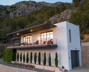Exterior view of House or chalet for sale in El Castell de Guadalest  with Air Conditioner, Terrace and Swimming Pool