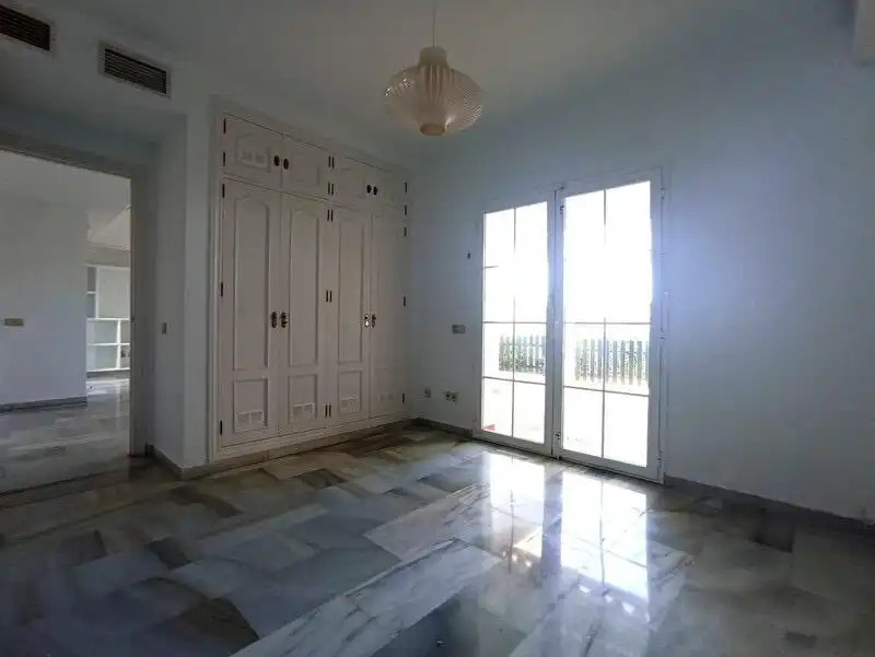 Terraced house with pool for sale in Manilva Pueblo