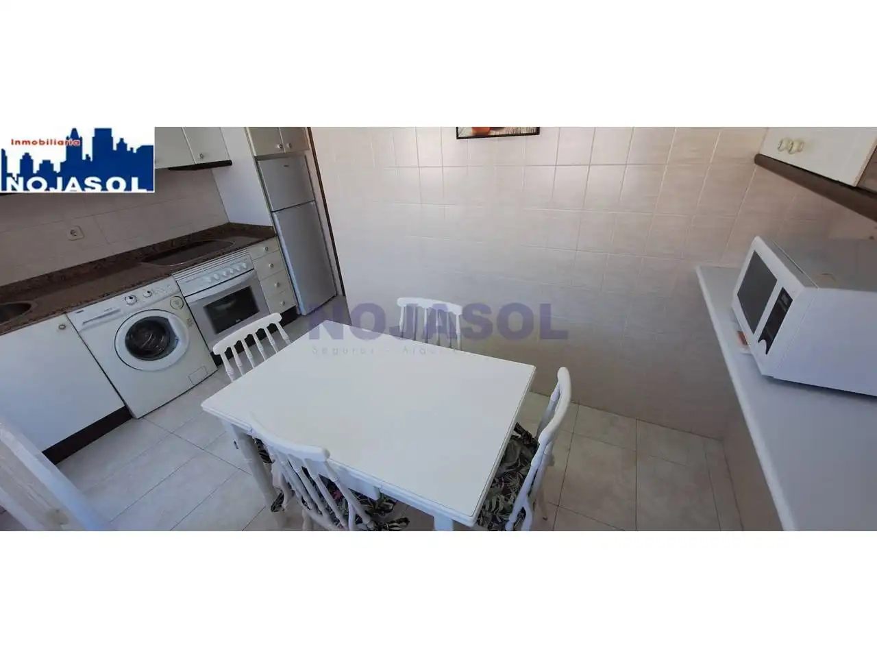 Cuina de Dúplex de lloguer en Noja amb Calefacció, Terrassa i Moblat