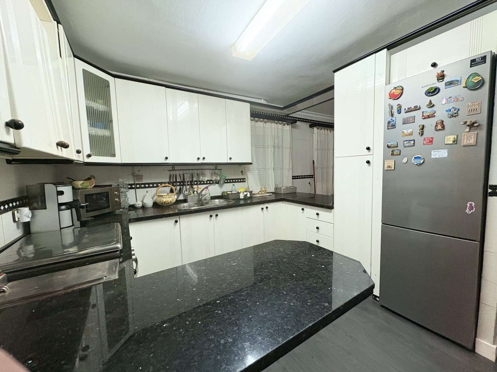 Kitchen of Apartment to share in  Sevilla Capital  with Air Conditioner, Heating and Terrace