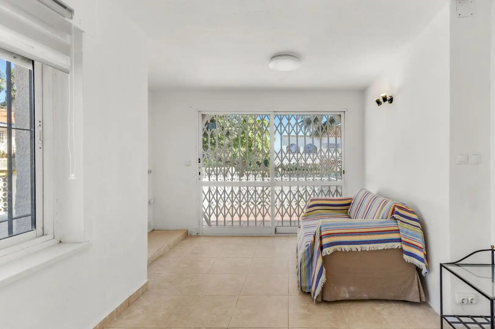 Living room of Houses for sale in Benalmádena  with Air Conditioner, Private garden and Swimming Pool