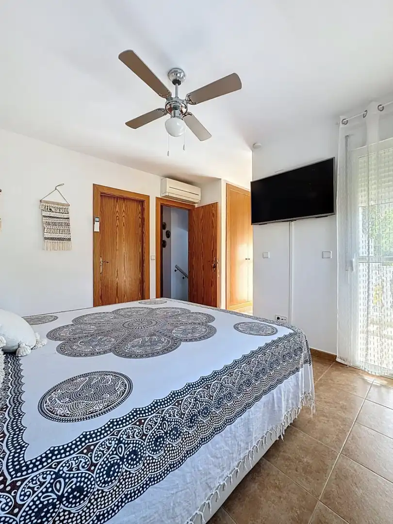 Dormitori de Casa adosada en venda en L'Alfàs del Pi amb Aire condicionat, Jardí privat i Terrassa