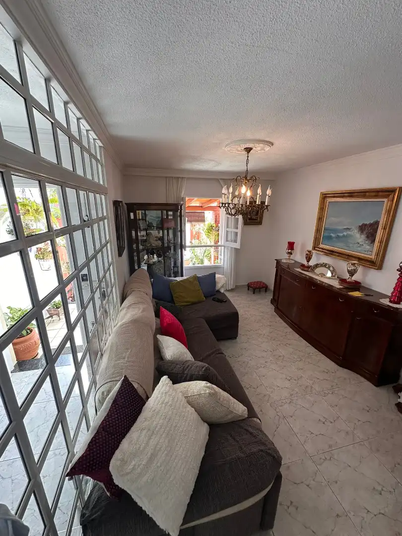 Sala de estar de Casa adosada en venta en Las Palmas de Gran Canaria con Aire acondicionado, Jardín privado y Terraza