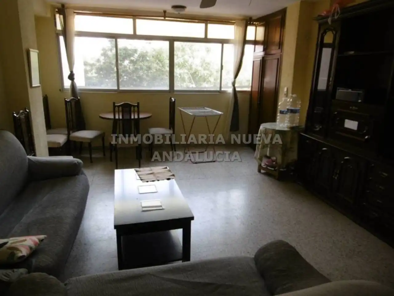 Sala d'estar de Pis de lloguer en Almería amb Moblat