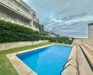 Swimming pool of Flat for sale in Sanxenxo  with Heating, Private garden and Parquet flooring