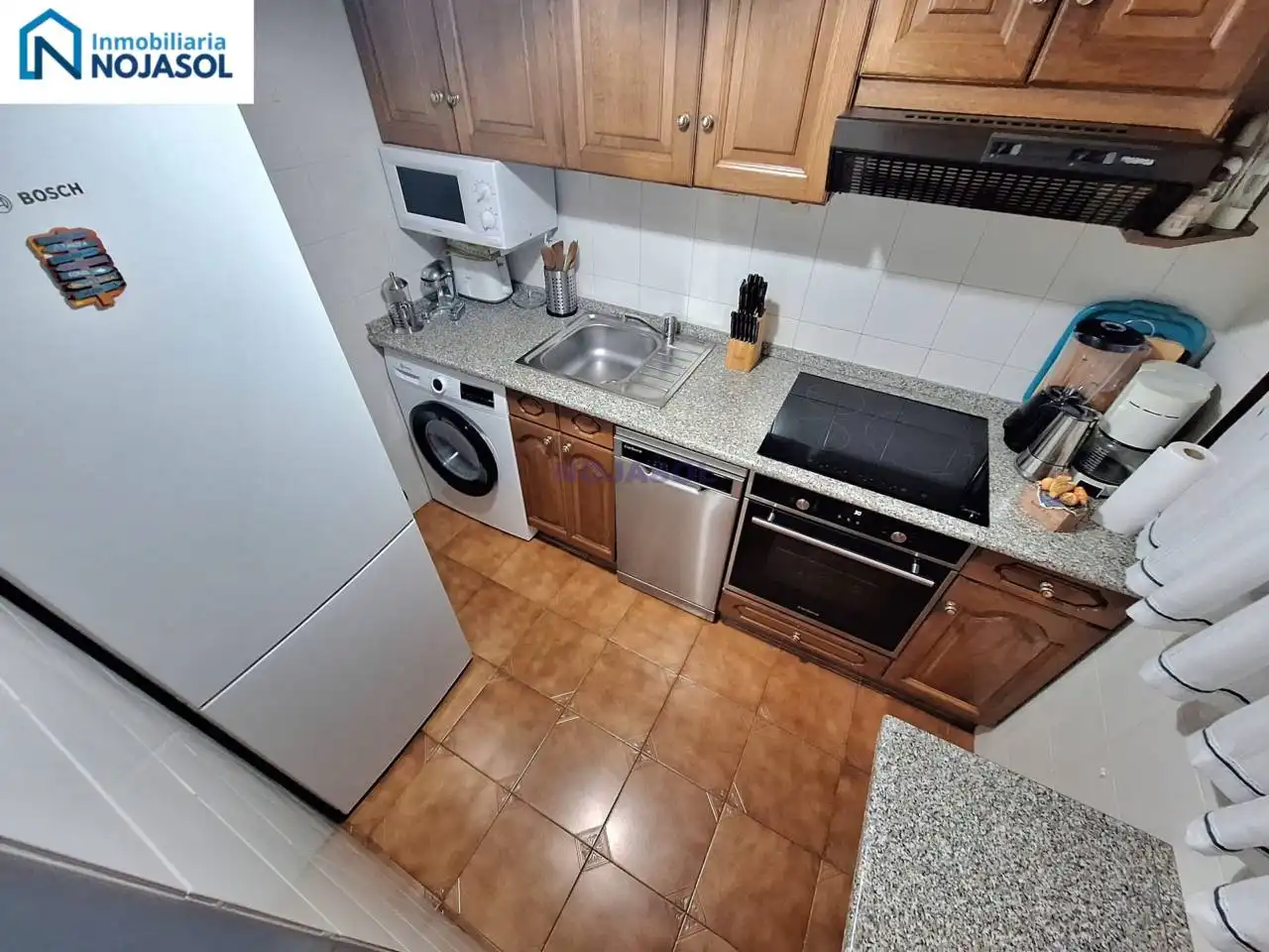 Cuina de Dúplex de lloguer en Noja amb Calefacció, Terrassa i Moblat