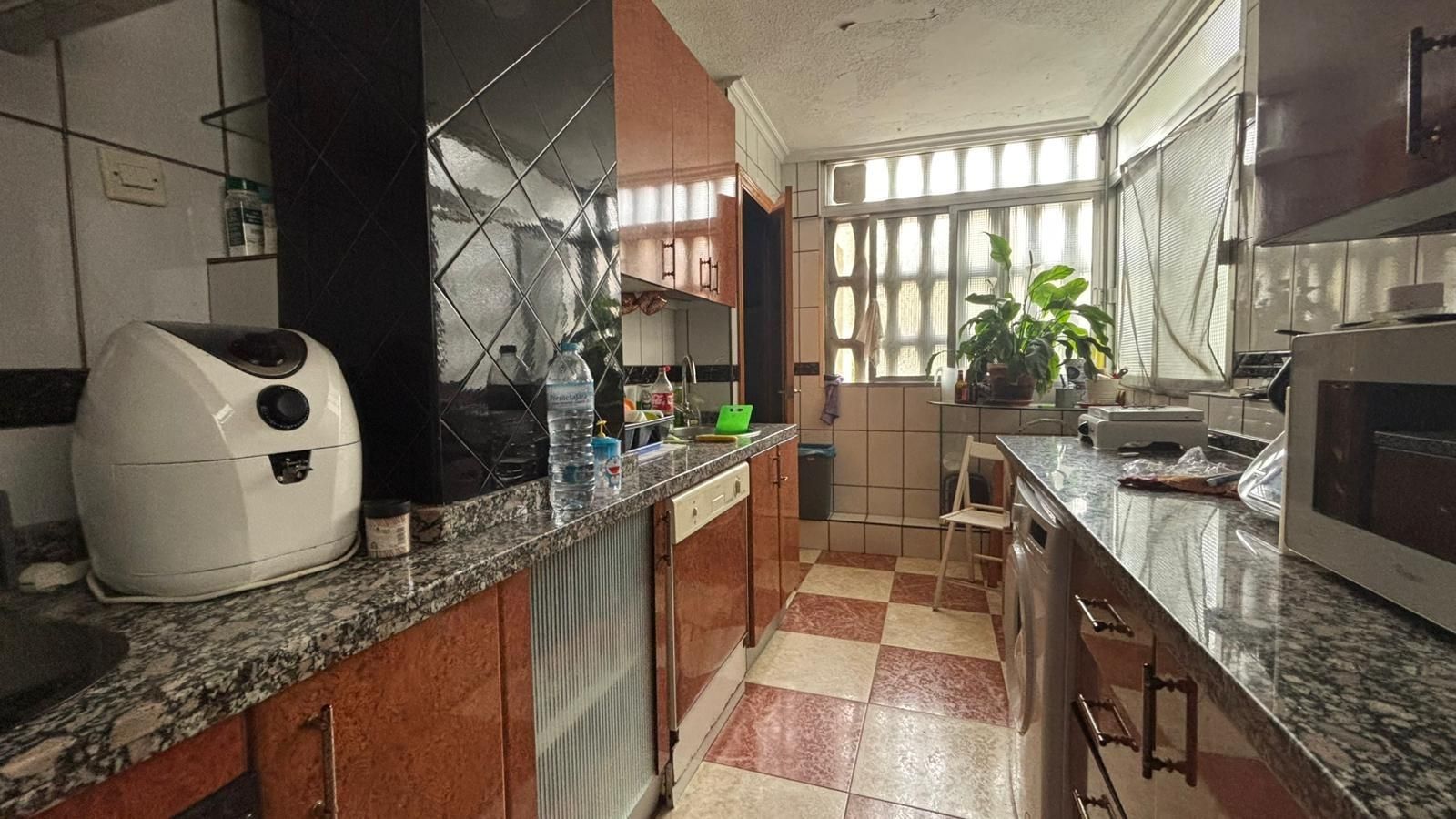 Kitchen of Flat for sale in  Sevilla Capital  with Air Conditioner, Private garden and Terrace