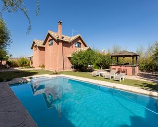 Swimming pool of House or chalet for sale in Dílar  with Air Conditioner, Heating and Private garden