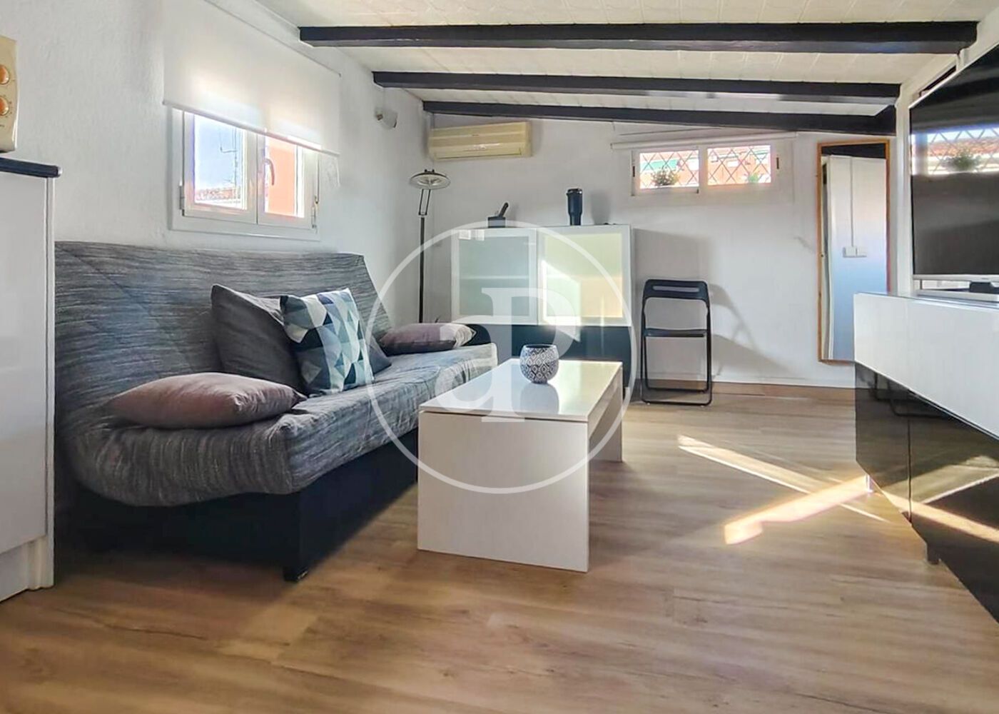 Sala d'estar de Loft de lloguer en  Barcelona Capital amb Aire condicionat i Moblat