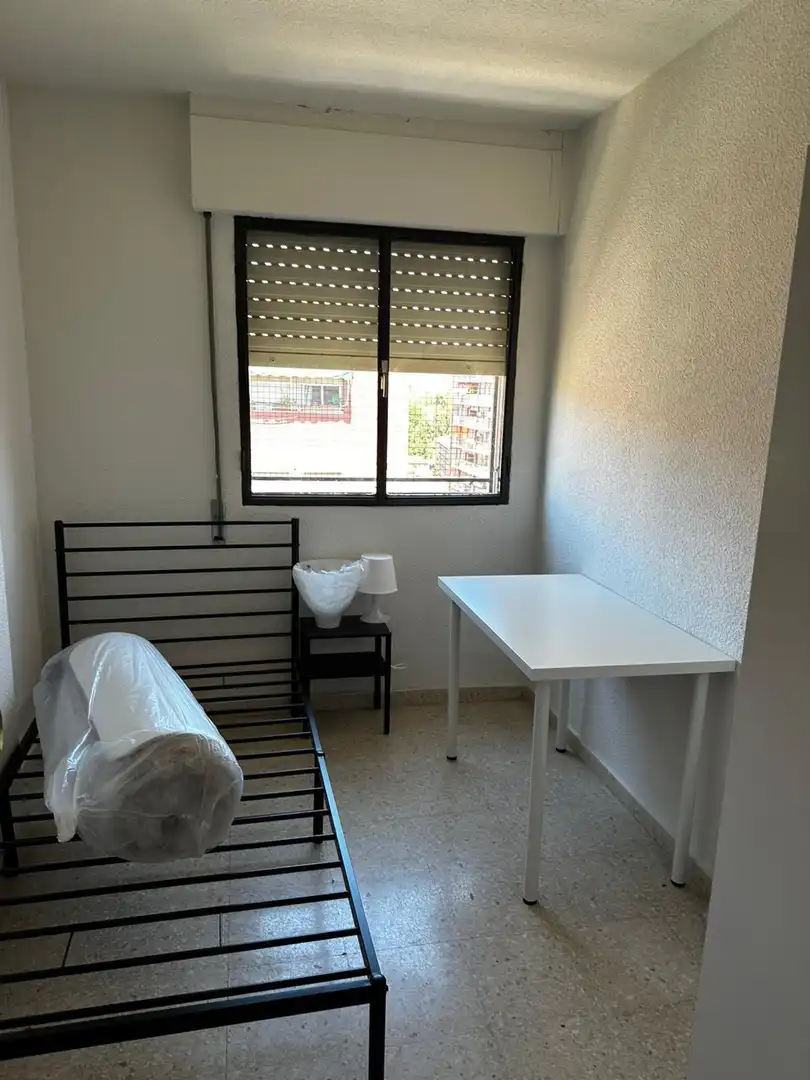 Bedroom of Flat for share in Granada  with Air Conditioner, Terrace and Furnished