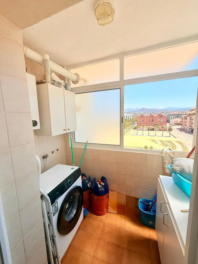 Dormitori de Apartament de lloguer en Vélez-Málaga amb Piscina comunitària
