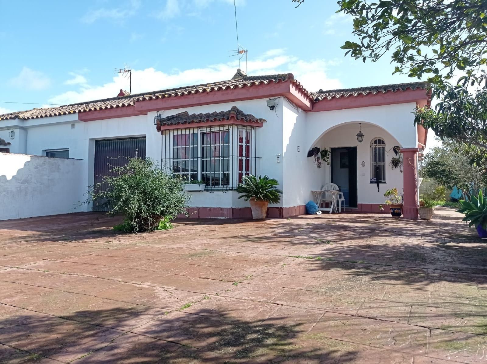 Exterior view of House or chalet for sale in Chiclana de la Frontera  with Air Conditioner, Private garden and Terrace