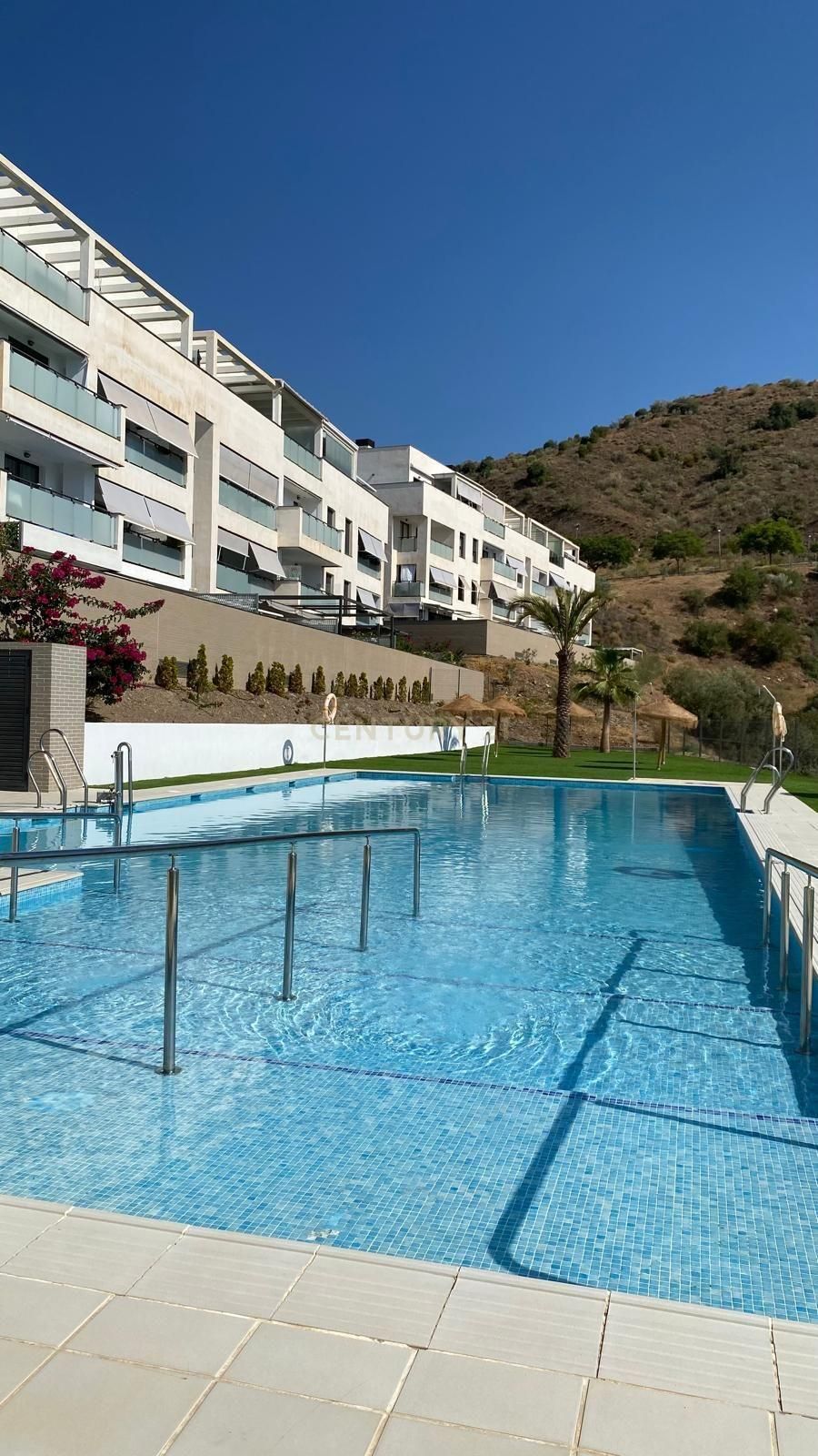 Swimming pool of Flat for sale in Rincón de la Victoria  with Air Conditioner, Storage room and Oven