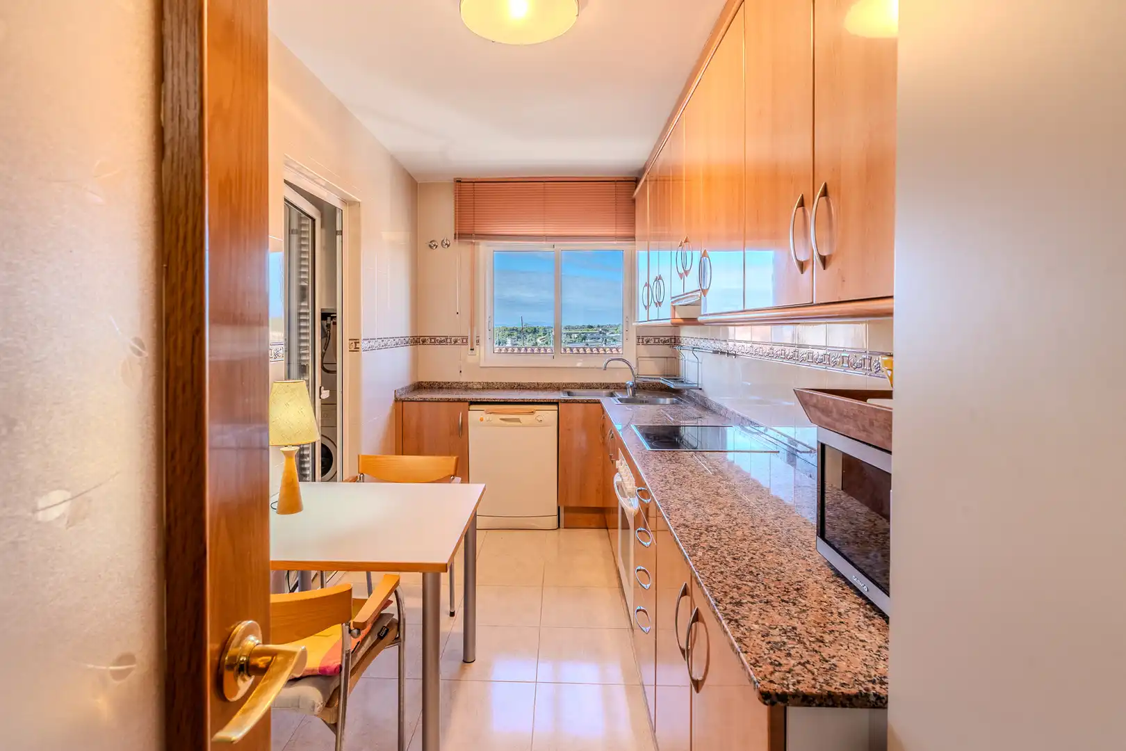 Cocina de Dúplex en venta en L'Ampolla con Aire acondicionado, Calefacción y Terraza