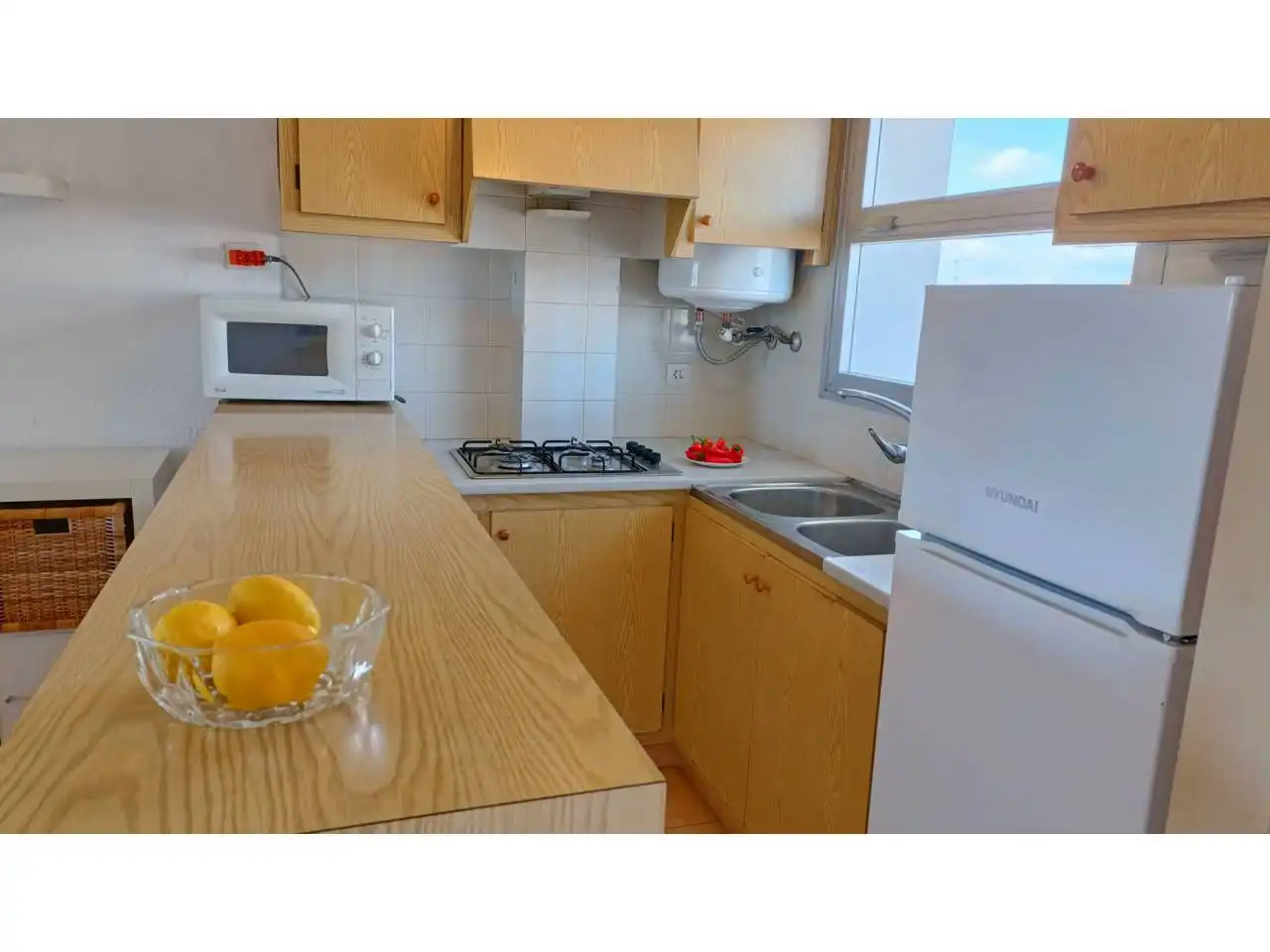 Cocina de Piso en venta en L'Escala con Terraza, Amueblado y Piscina comunitaria