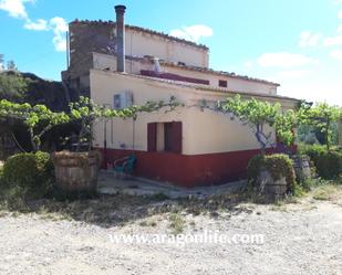 Vista exterior de Finca rústica en venda en Caspe amb Jardí privat, Piscina i Moblat