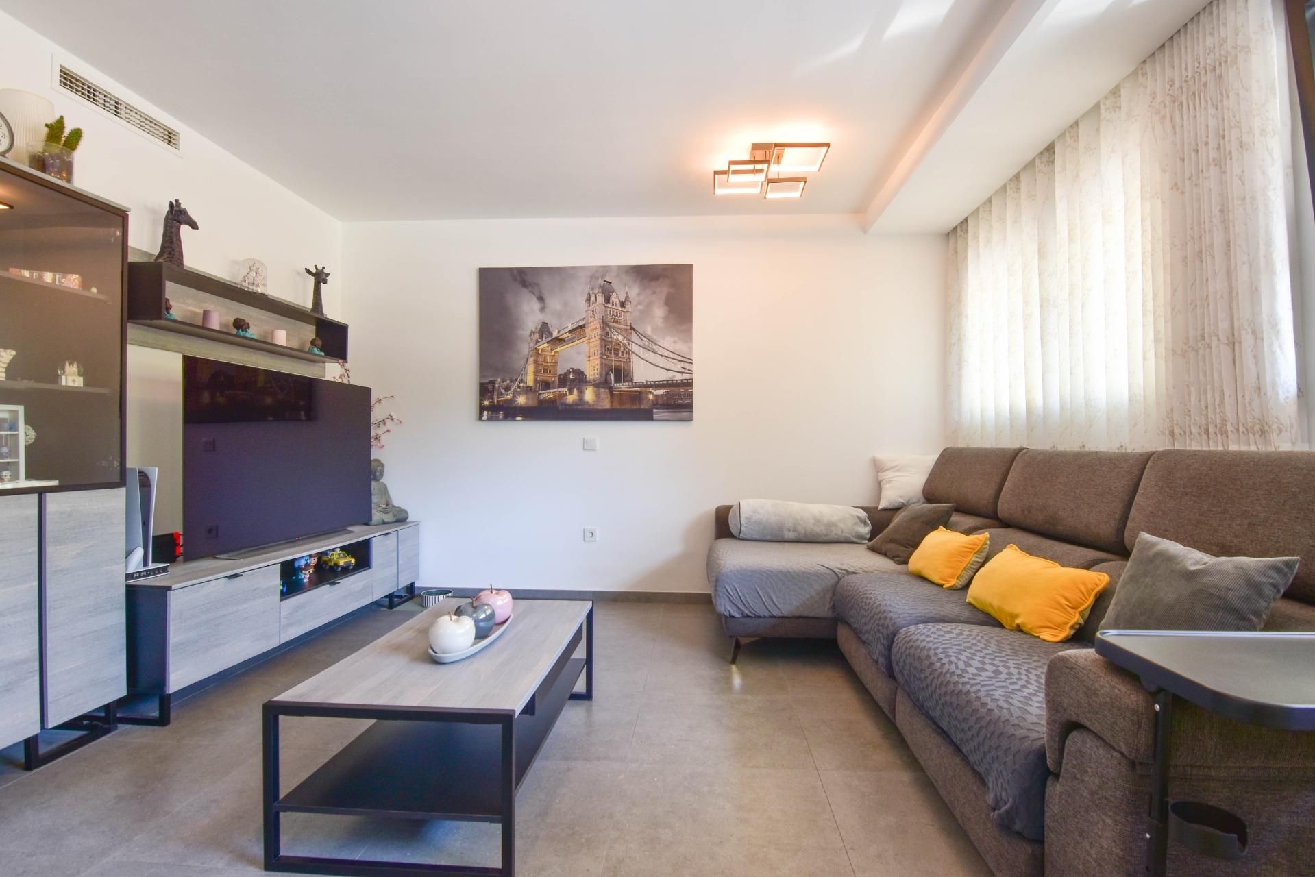 Living room of Planta baja for sale in Paiporta  with Air Conditioner and Storage room