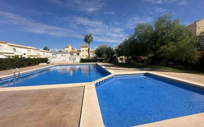 Swimming pool of Single-family semi-detached for sale in Santa Pola  with Air Conditioner, Terrace and Balcony