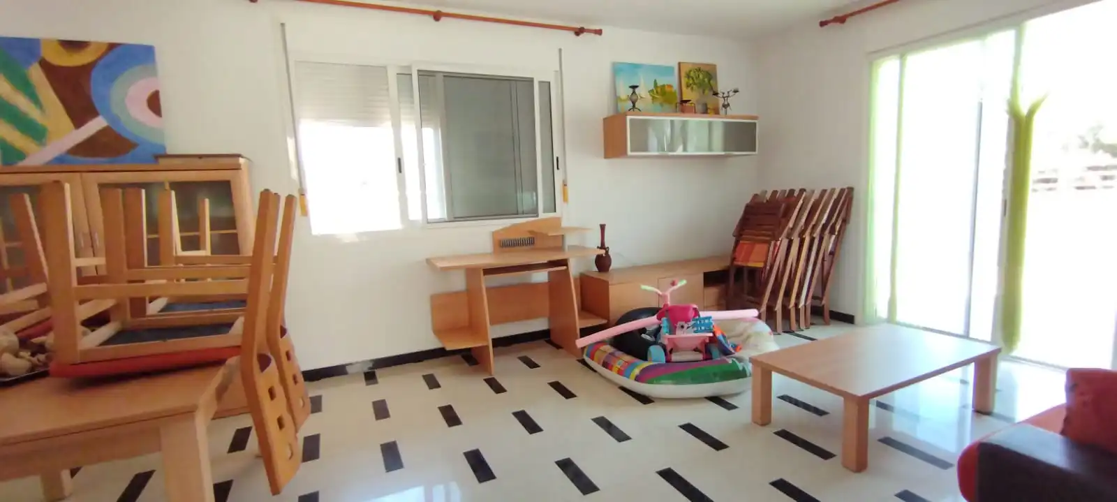 Sala d'estar de Casa adosada en venda en Alcanar amb Parquet, Terrassa i Traster