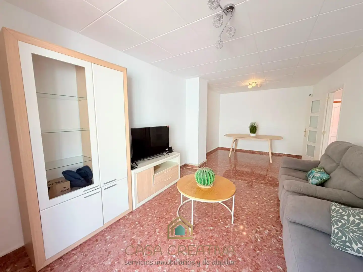 Sala de estar de Casa adosada en venta en Picanya con Jardín privado, Terraza y Trastero