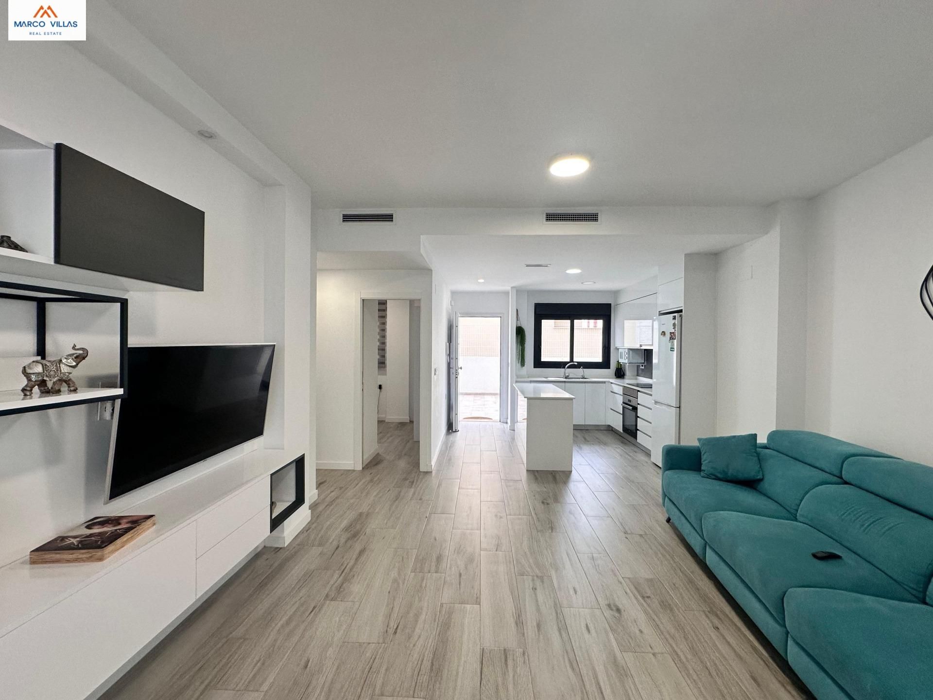 Sala de estar de Planta baja en venta en Guardamar del Segura con Aire acondicionado, Jardín privado y Piscina comunitaria