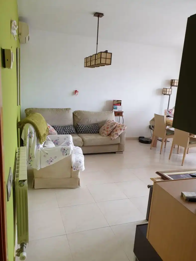 Sala de estar de Dúplex en venta en Terrassa con Aire acondicionado, Trastero y Amueblado