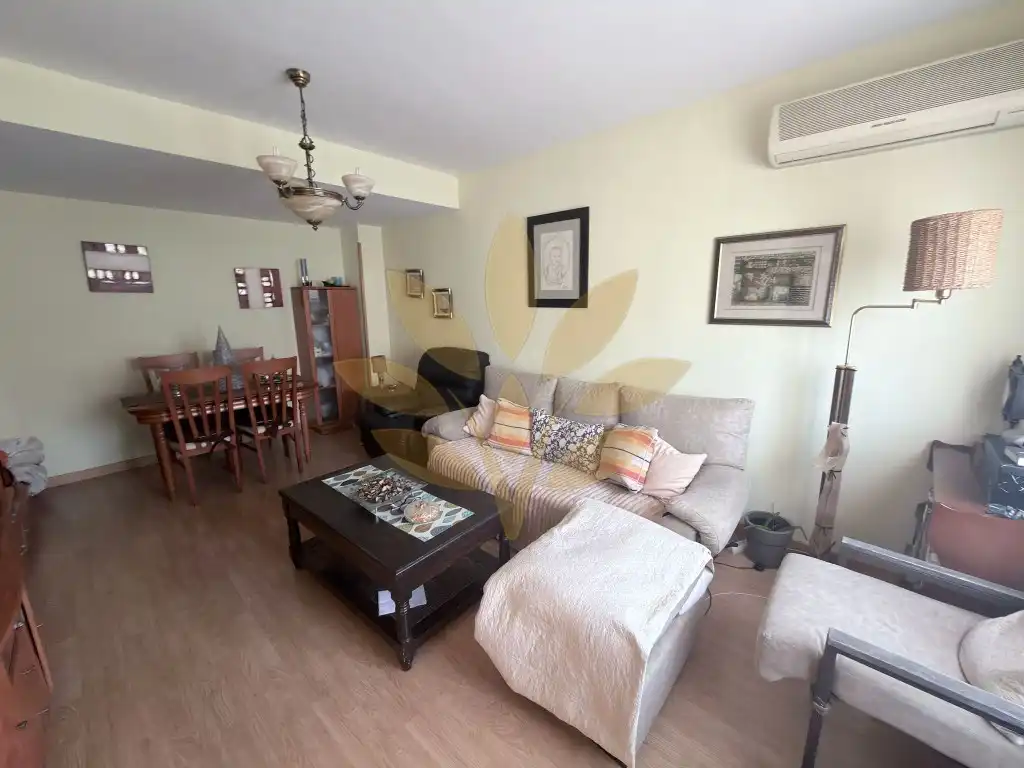 Sala de estar de Casa adosada en venta en Cáceres