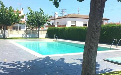 Swimming pool of Single-family semi-detached for sale in Torredembarra  with Air Conditioner, Terrace and Swimming Pool