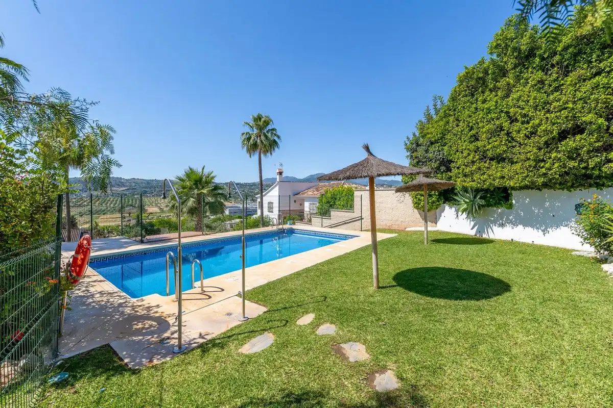 Swimming pool of Detached homes for sale in Coín  with Terrace, Storage room and Alarm