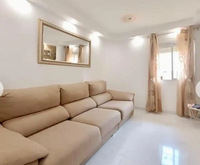 Sala de estar de Planta baja en venta en Benidorm con Aire acondicionado y Jardín privado