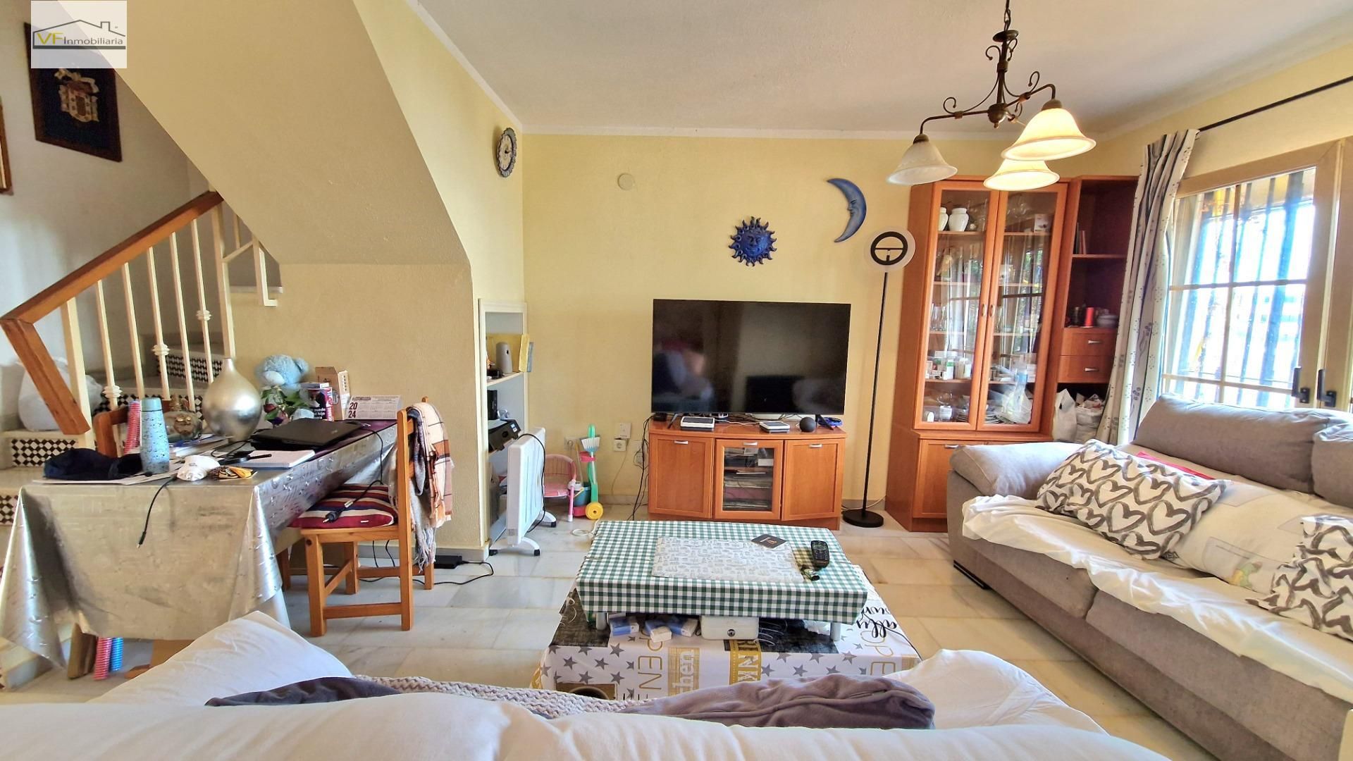 Sala d'estar de Casa adosada en venda en Vélez-Málaga amb Jardí privat, Balcó i Piscina comunitària