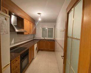 Kitchen of Duplex for sale in Carlet  with Air Conditioner, Oven and Balcony