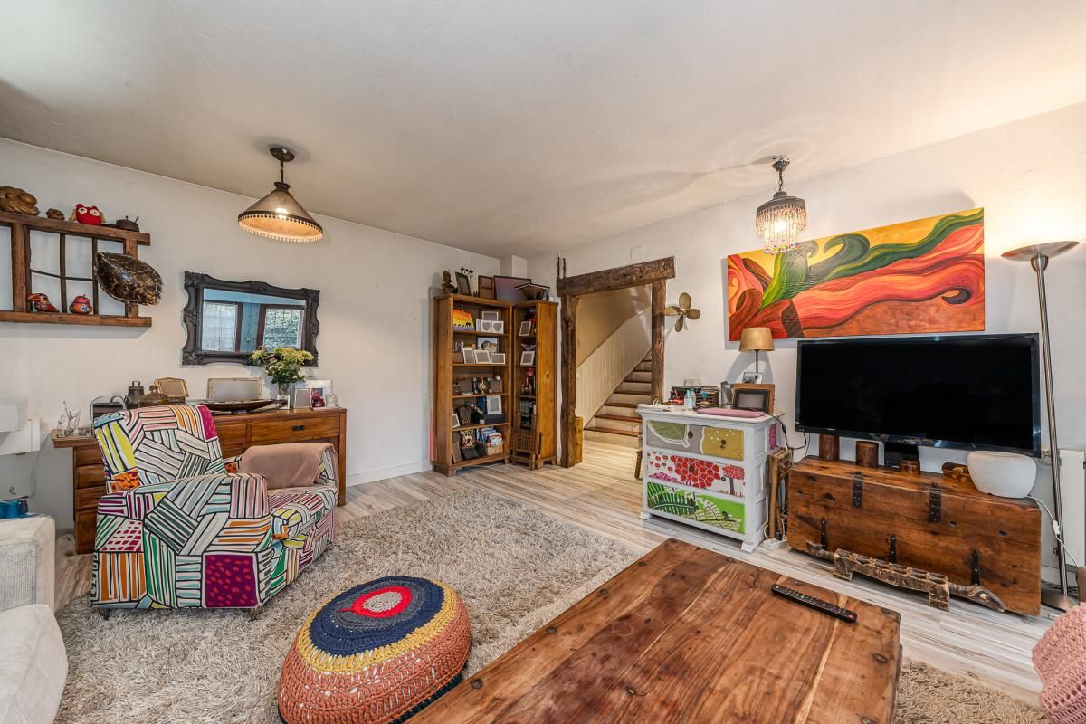 Sala de estar de Casa adosada en venta en Majadahonda con Jardín privado, Trastero y Piscina