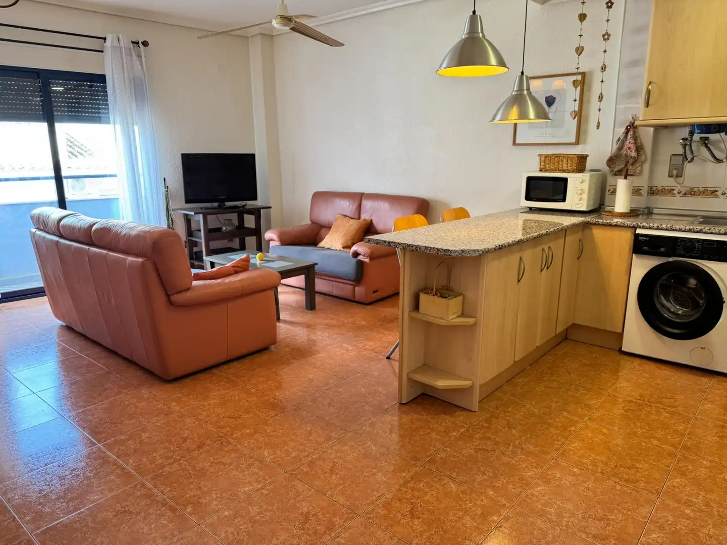 Sala de estar de Piso en venta en La Nucia con Terraza y Piscina comunitaria