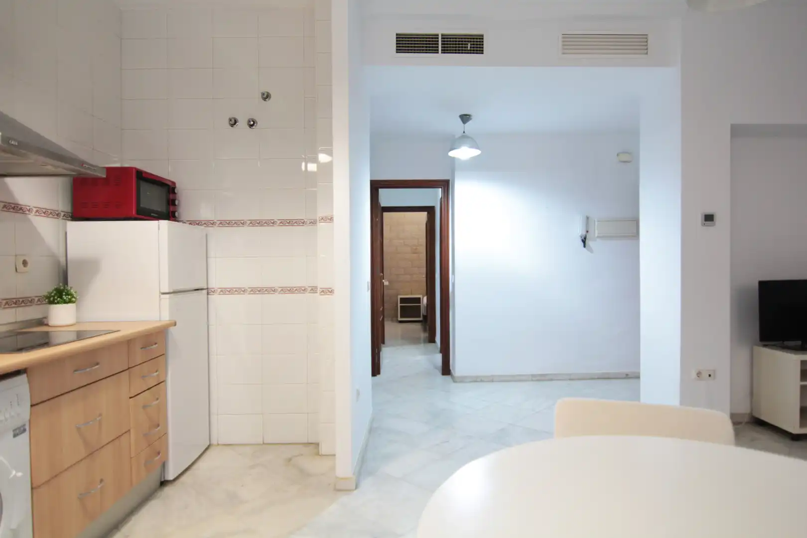 Kitchen of Flat for sale in Sevilla  with Air Conditioner, Heating and Furnished