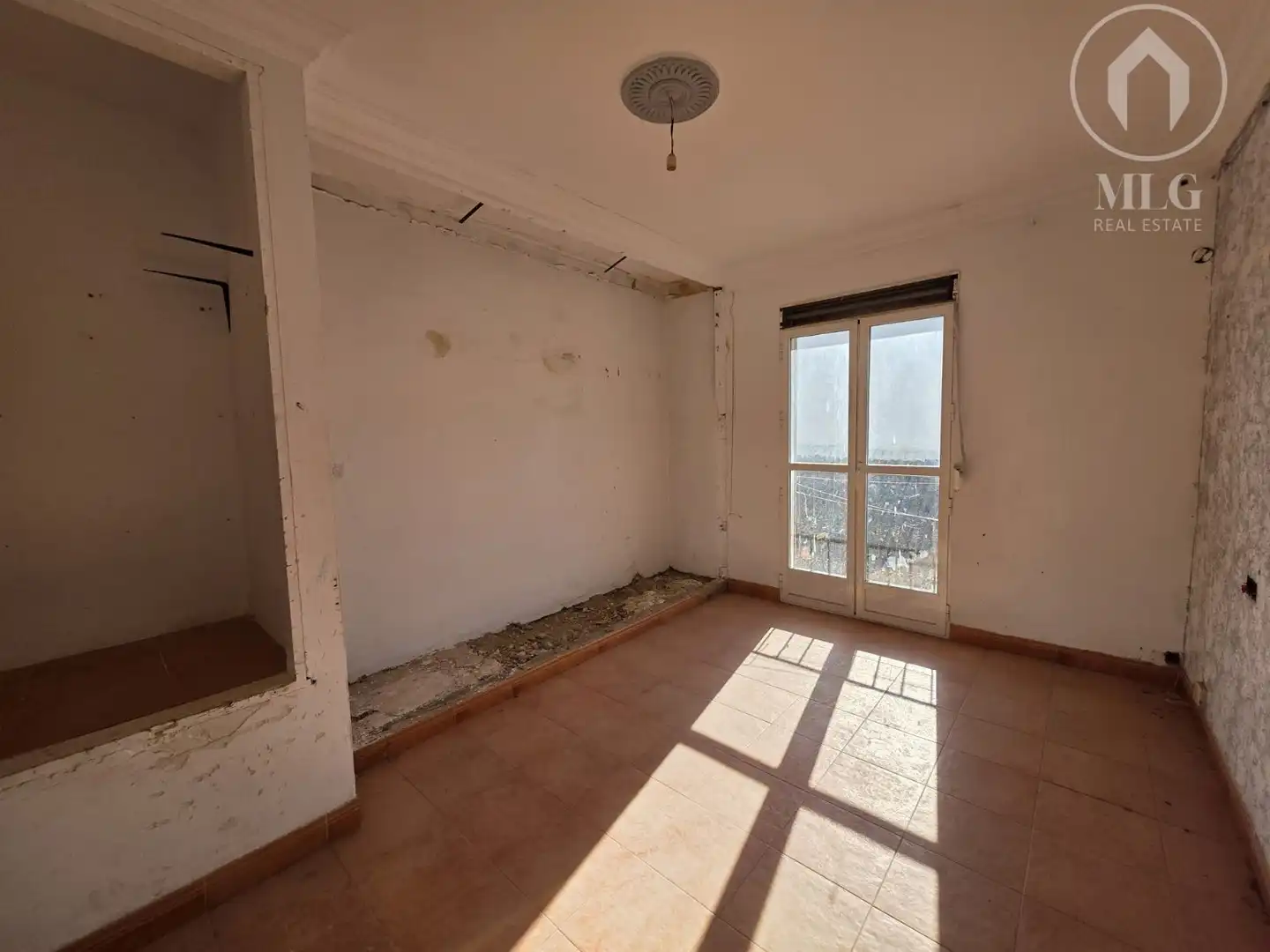 Sala d'estar de Casa o xalet en venda en Alameda