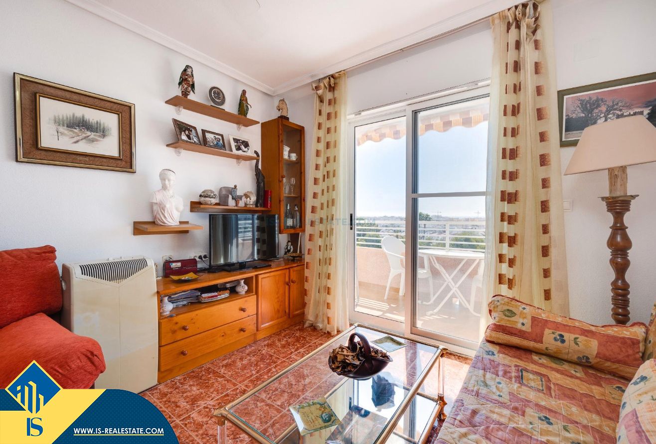 Sala d'estar de Apartament en venda en Torrevieja amb Calefacció, Terrassa i Moblat