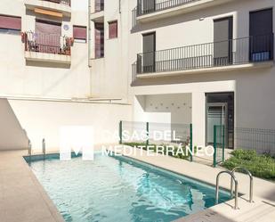 Swimming pool of Planta baja for sale in  Valencia Capital  with Air Conditioner