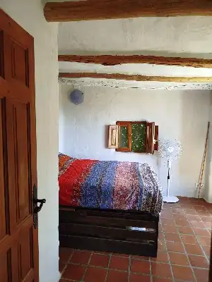 Dormitori de Finca rústica en venda en Alpujarra de la Sierra amb Calefacció, Jardí privat i Moblat