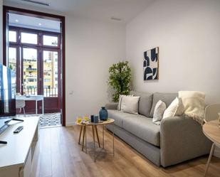 Living room of Study to share in  Barcelona Capital  with Air Conditioner and Terrace