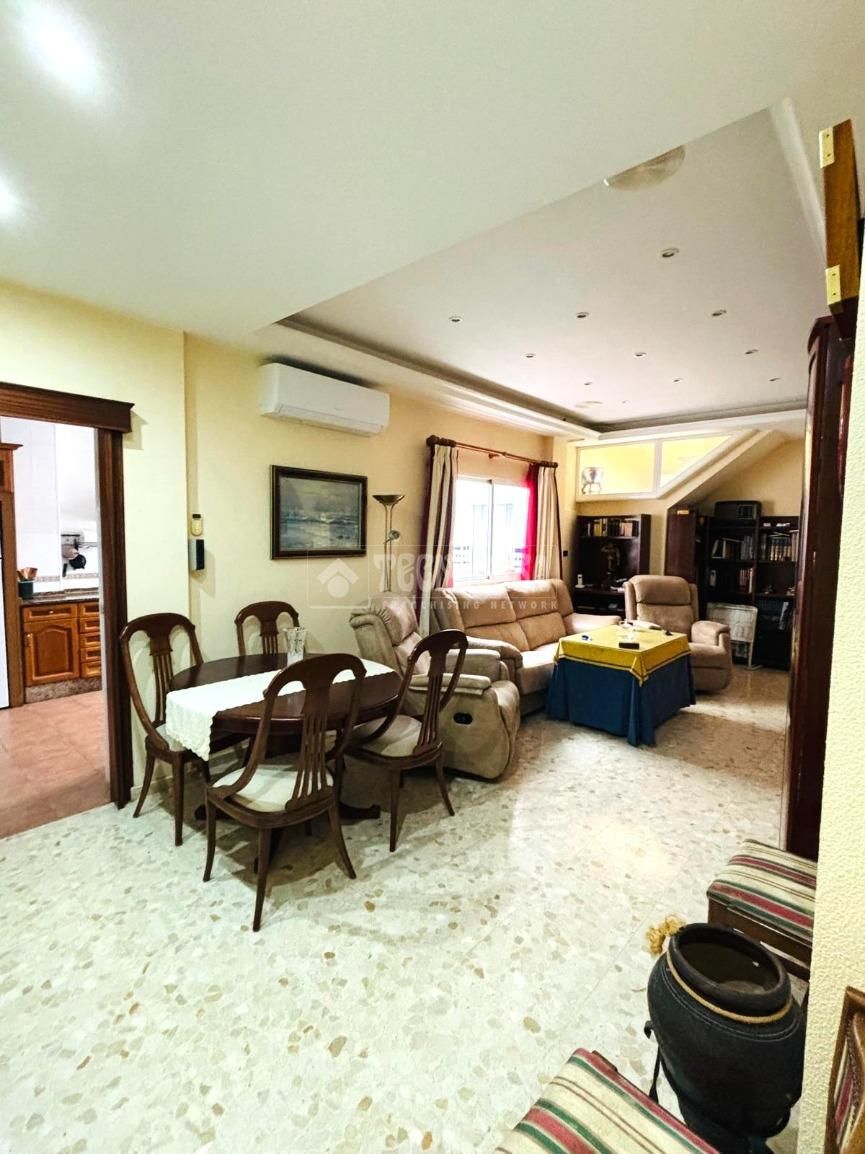 Sala d'estar de Casa adosada en venda en San Fernando amb Aire condicionat